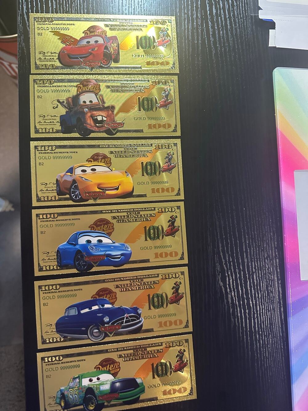 Disney Pixar Cars 6 Piece Gold Foil Novelty $100 Note Collectible Set